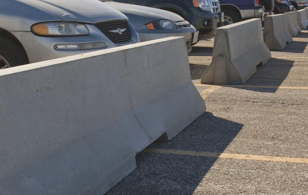 Precast Concrete Traffic And Safety Barriers In Parking Lot
